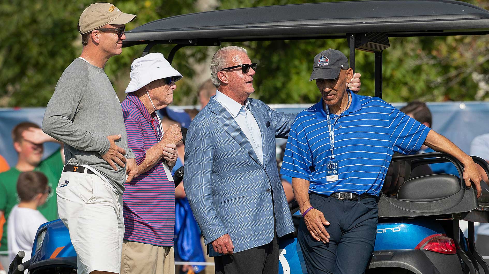 Peyton Manning talks with former GM Bill Polian, Indianapolis Colts owner Jim Irsay and former head coach Tony Dungy during their joint practice against the Cleveland Browns at Grand Park in Westfield on Thursday, August 15, 2019. Colts Preseason Training Camp