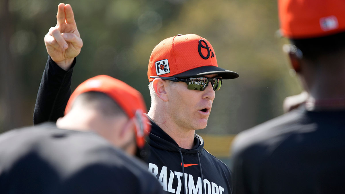 Infield coach Tony Mansolino talks to players before they begin drills on Tuesday. The Baltimore Orioles held their first full-squad workout of the 2025 spring training season on Tuesday, Feb. 18th in Sarasota, Florida