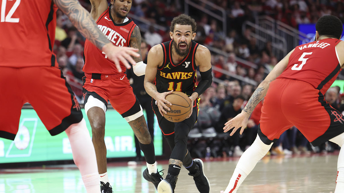 Atlanta Hawks guard Trae Young (11) drives with the ball during the fourth quarter against the Houston Rockets at Toyota Center.