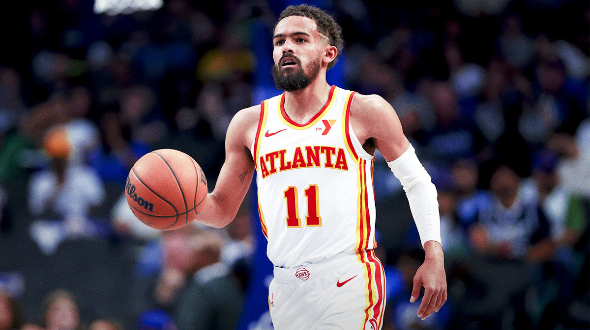 Atlanta Hawks guard Trae Young (11) dribbles against the Dallas Mavericks during the second half at American Airlines Center.