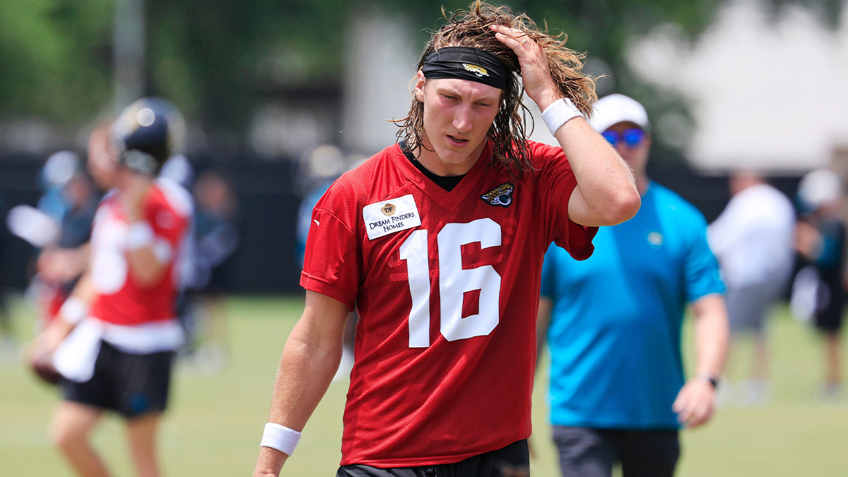 Jacksonville Jaguars quarterback Trevor Lawrence (16) walks off the field during the first organized team activity at Miller Electric Center