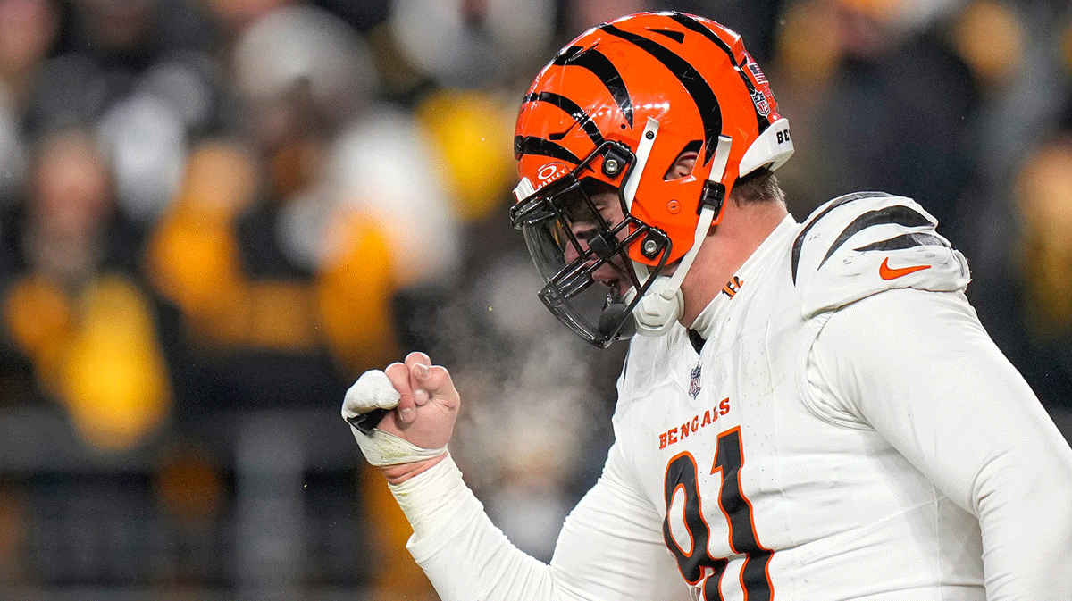 Cincinnati Bengals defensive end Trey Hendrickson (91) celebrates as the Steelers prepare to punt in the fourth quarter of the NFL Week 18 game between the Pittsburgh Steelers and the Cincinnati Bengals at Acrisure Stadium in Pittsburgh on Saturday, Jan. 4, 2025. The Bengals won 19-17 to finish the regular season at 9-8.