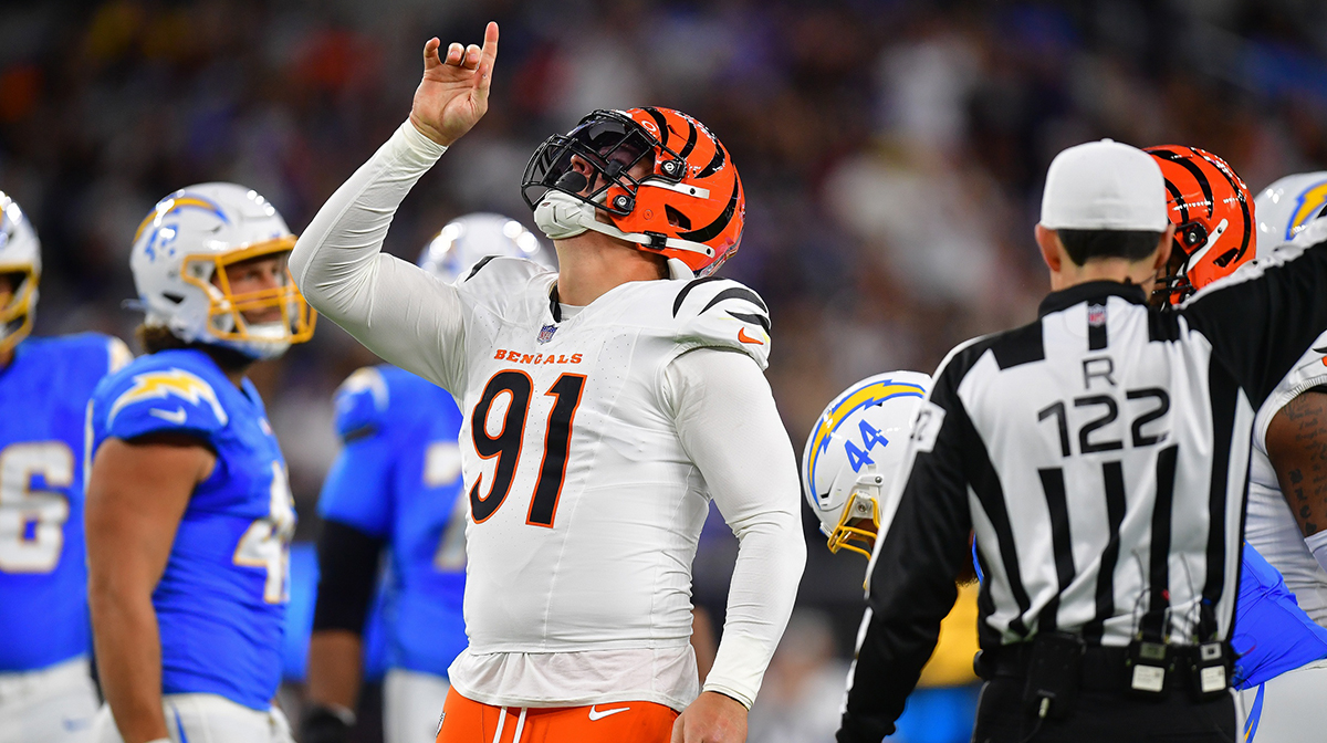 Nov 17, 2024; Inglewood, California, USA; Cincinnati Bengals defensive end Trey Hendrickson (91) reacts after sacking Los Angeles Chargers quarterback Justin Herbert (10) during the first half at SoFi Stadium.