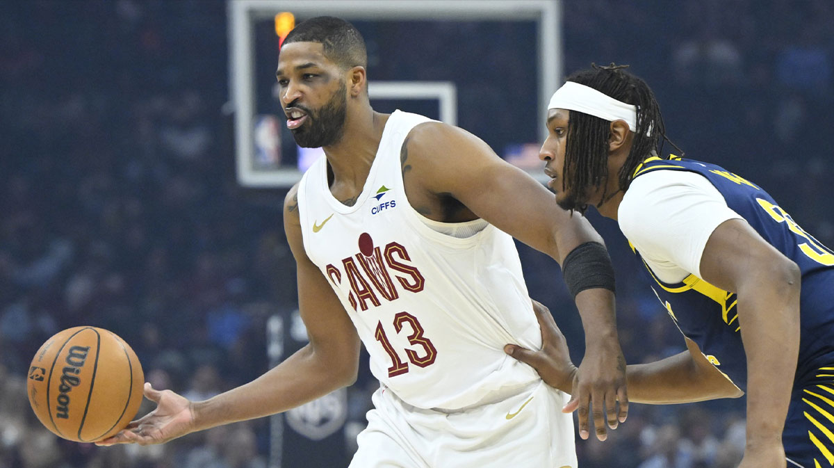 Cleveland Cavaliers center Tristan Thompson (13) passes the ball beside Indiana Pacers center Myles Turner (33) in the first quarter at Rocket Arena.
