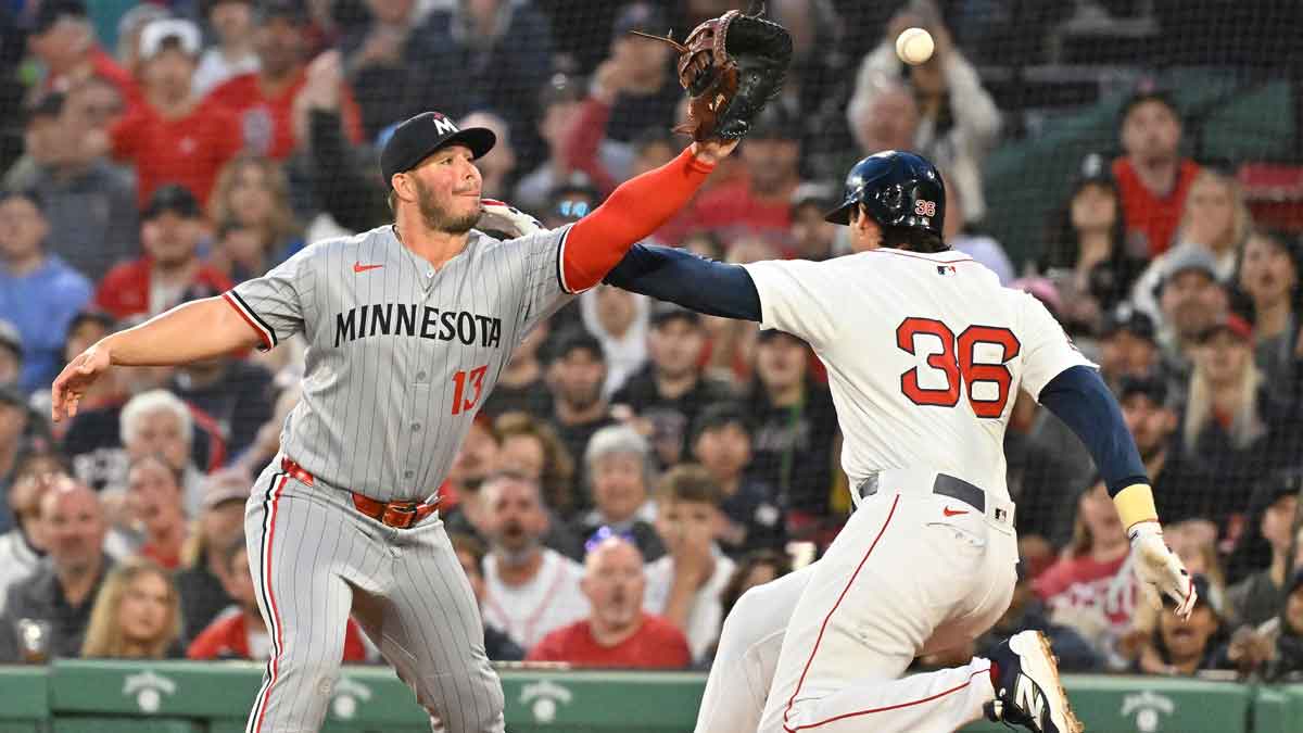 Boston Red Sox first baseman Triston Casas (36) runs to first base against Minnesota Twins first baseman Ty France (13) during the second inning at Fenway Park.