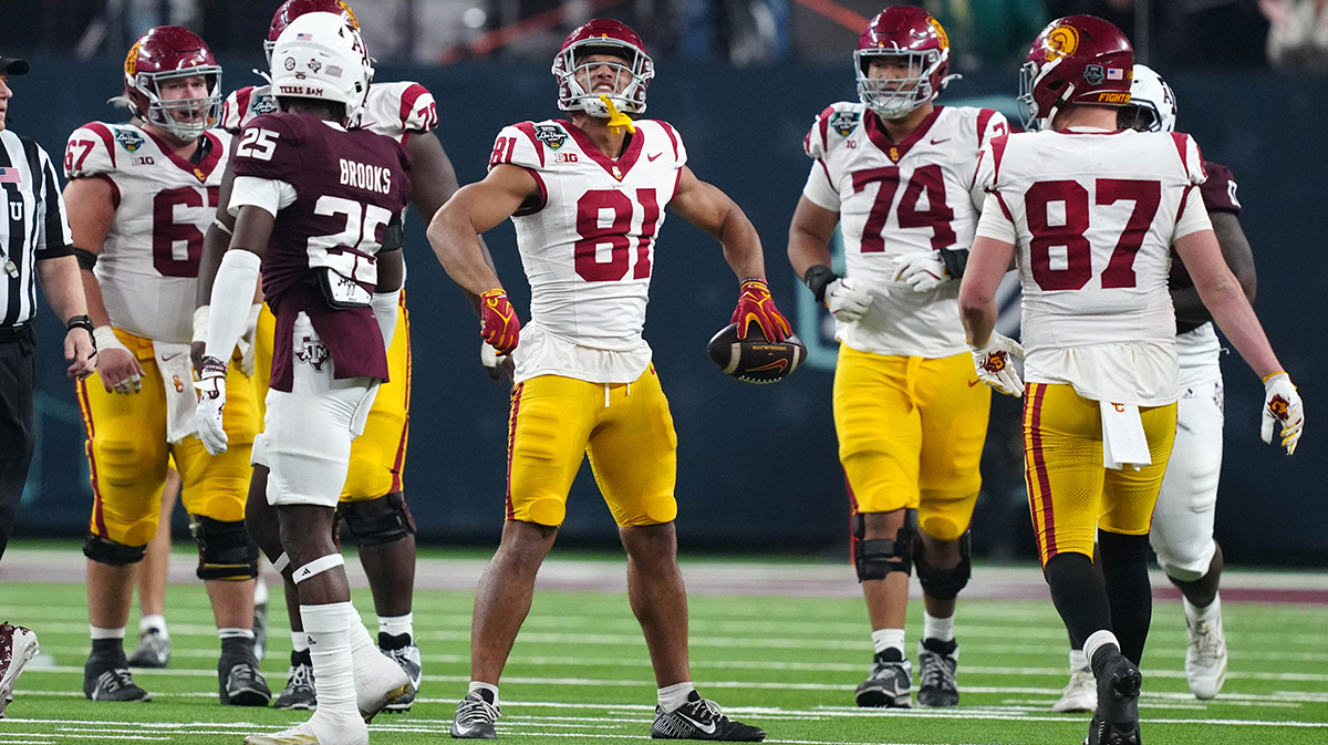 Dec 27, 2024; Las Vegas, NV, USA; Southern California Trojans wide receiver Kyle Ford (81) celebrates after a first down against the Texas A&M Aggies in the second half at Allegiant Stadium. Mandatory Credit: Kirby Lee-Imagn Images