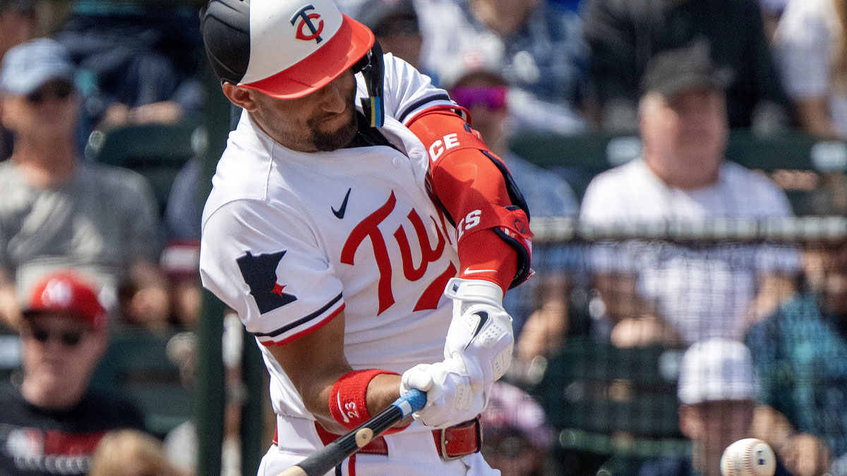 Minnesota Twins designated hitter Royce Lewis (23) bats against the New York Yankees in the first inning at Lee Health Sports Complex.