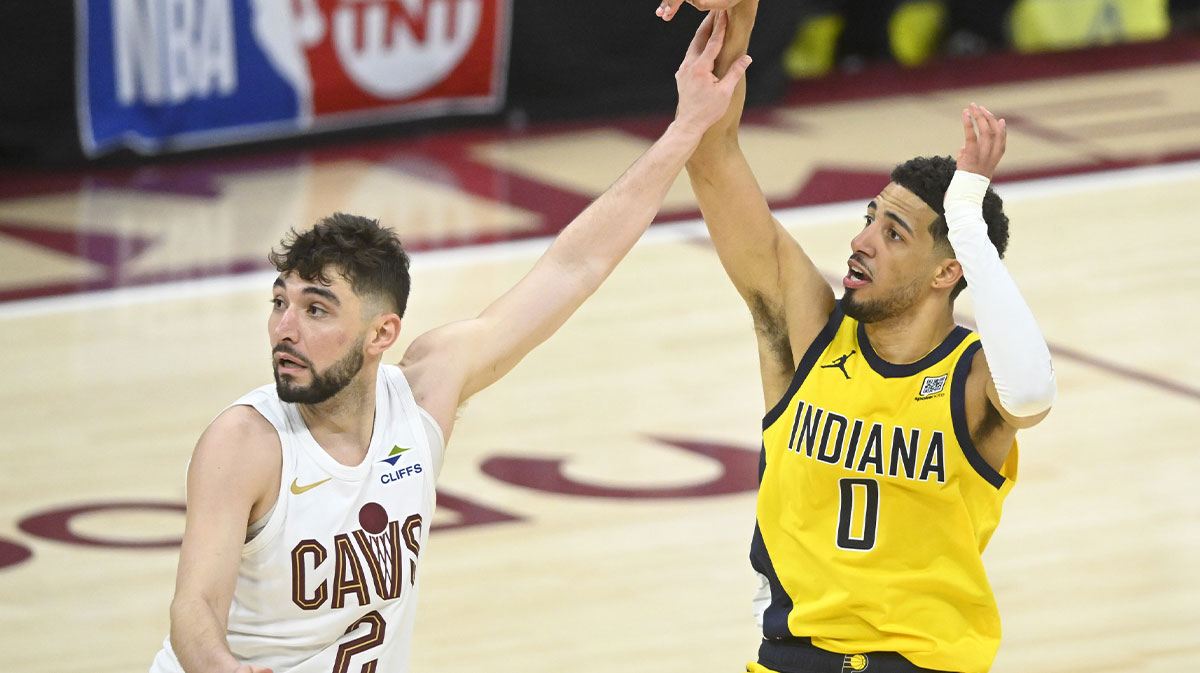 Cleveland Cavaliers guard Ty Jerome (2) defends Indiana Pacers guard Tyrese Haliburton (0) on a follow through for a game-winning three-point basket in the fourth quarter during game two of the second round of the 2025 NBA Playoffs at Rocket Arena.