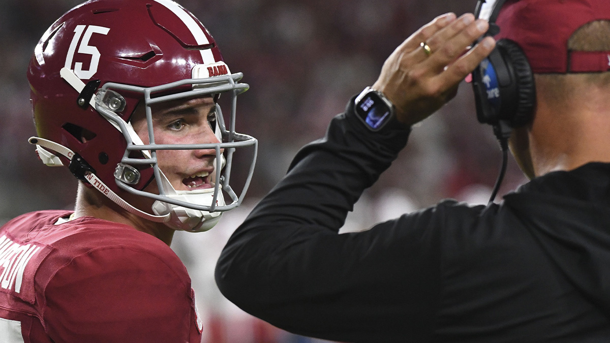 Alabama Crimson Tide quarterback Ty Simpson (15) talks with Alabama Crimson Tide head coach Kalen DeBoer at Bryant-Denny Stadium during the game between the Alabama Crimson Tide and the Western Kentucky Hilltoppers. Alabama defeated Western Kentucky 63-0.