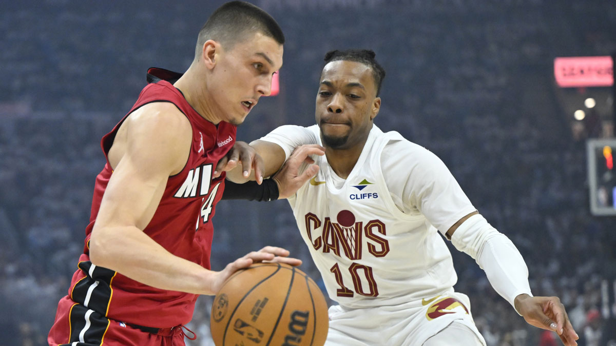 Miami Heat guard Tyler Herro (14) drives against Cleveland Cavaliers guard Darius Garland (10) in the first quarter at Rocket Arena.