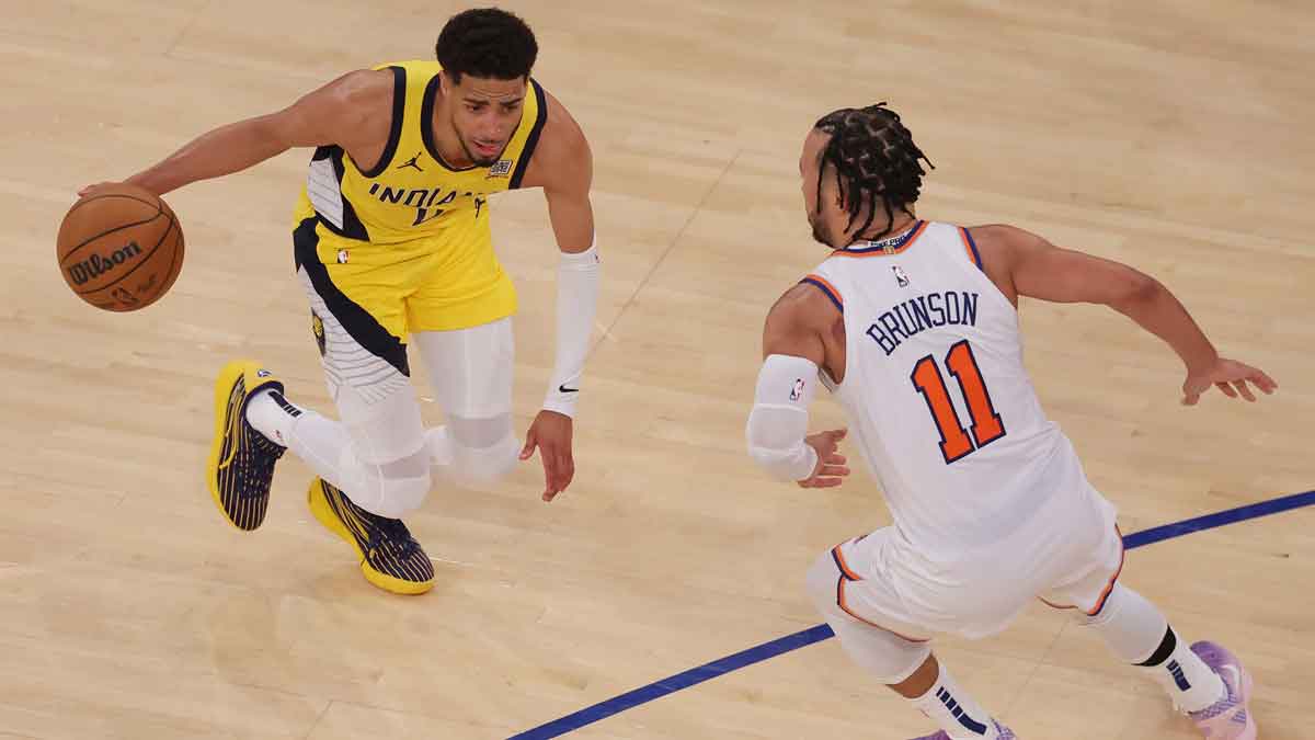 Indiana Pacers guard Tyrese Haliburton (0) controls the ball against New York Knicks guard Jalen Brunson (11) in overtime during game one of the eastern conference finals for the 2025 NBA Playoffs at Madison Square Garden.