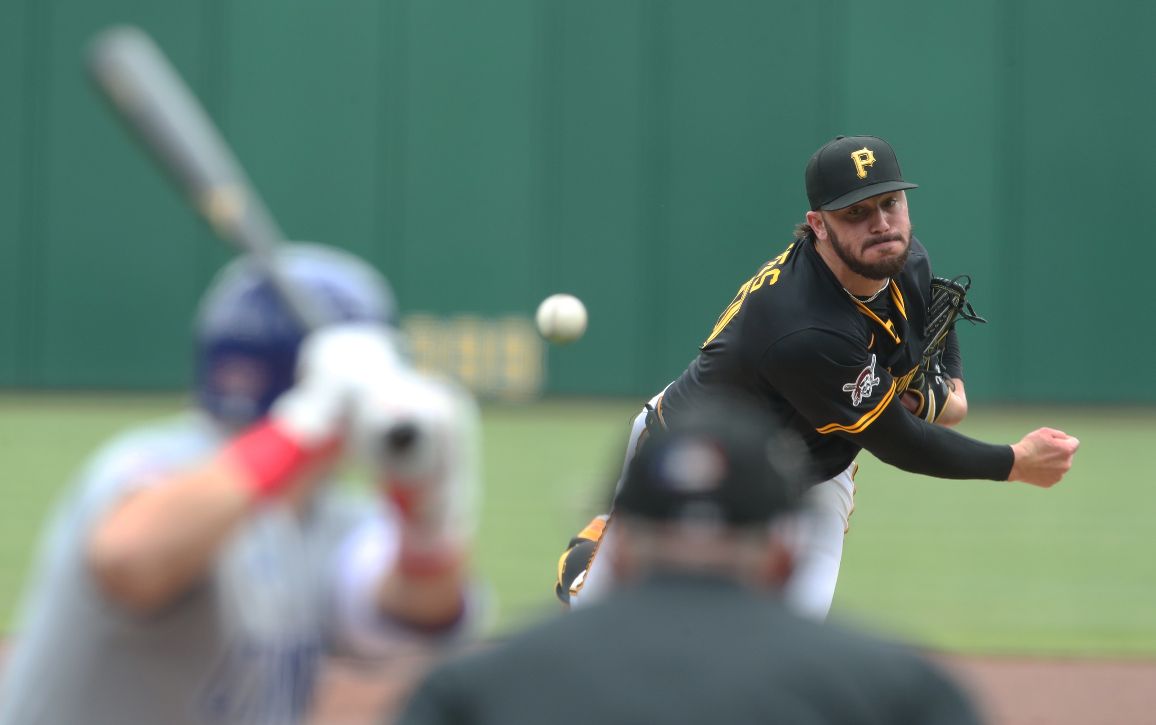 May 1, 2025; Pittsburgh, Pennsylvania, USA; Pittsburgh Pirates starting pitcher Paul Skenes (30) delivers a pitch to Chicago Cubs designated hitter Seiya Suzuki (27) during the first inning at PNC Park.