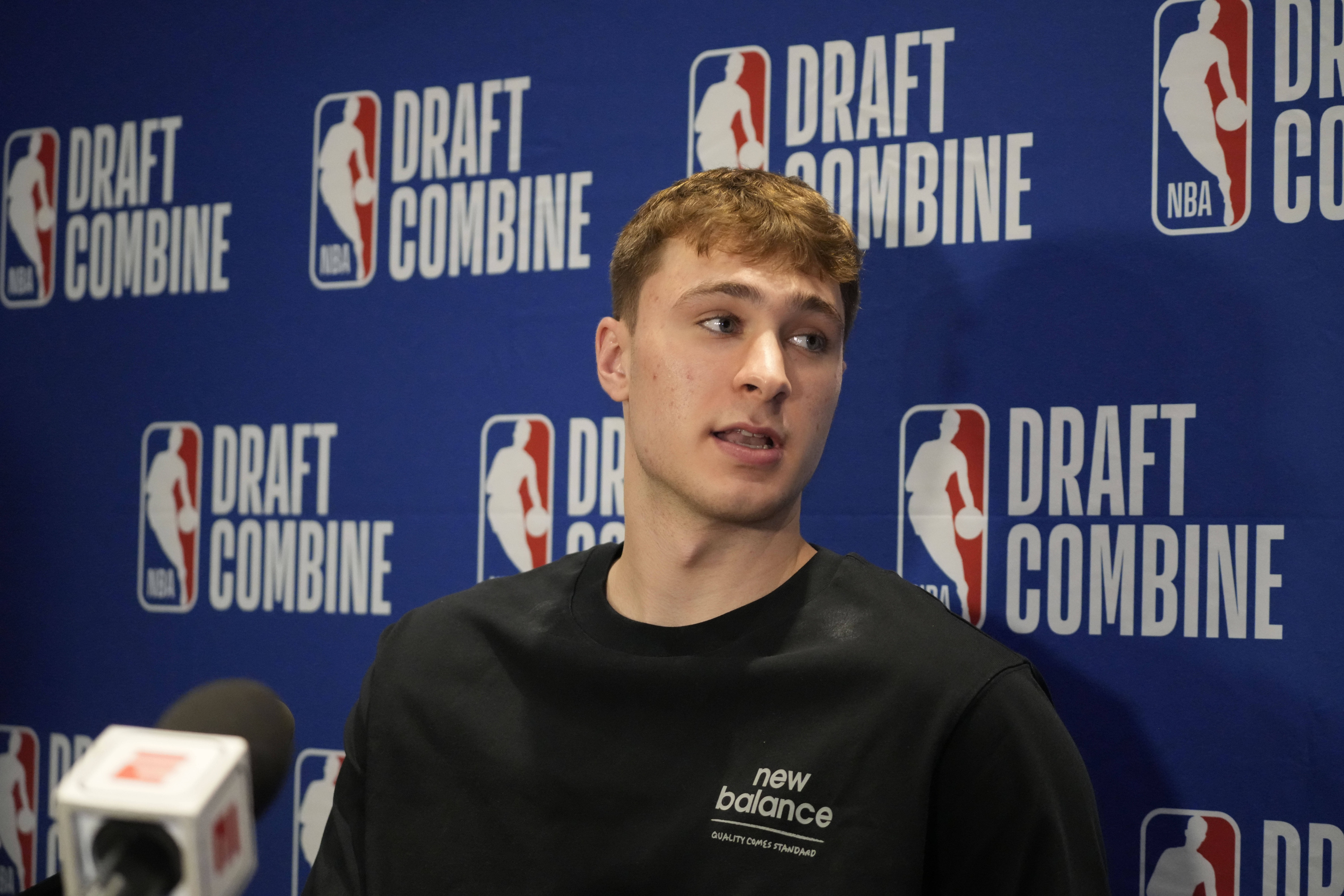 Cooper Flagg talks to the media during the 2025 NBA Draft Combine at Marriott Marquis Chicago.