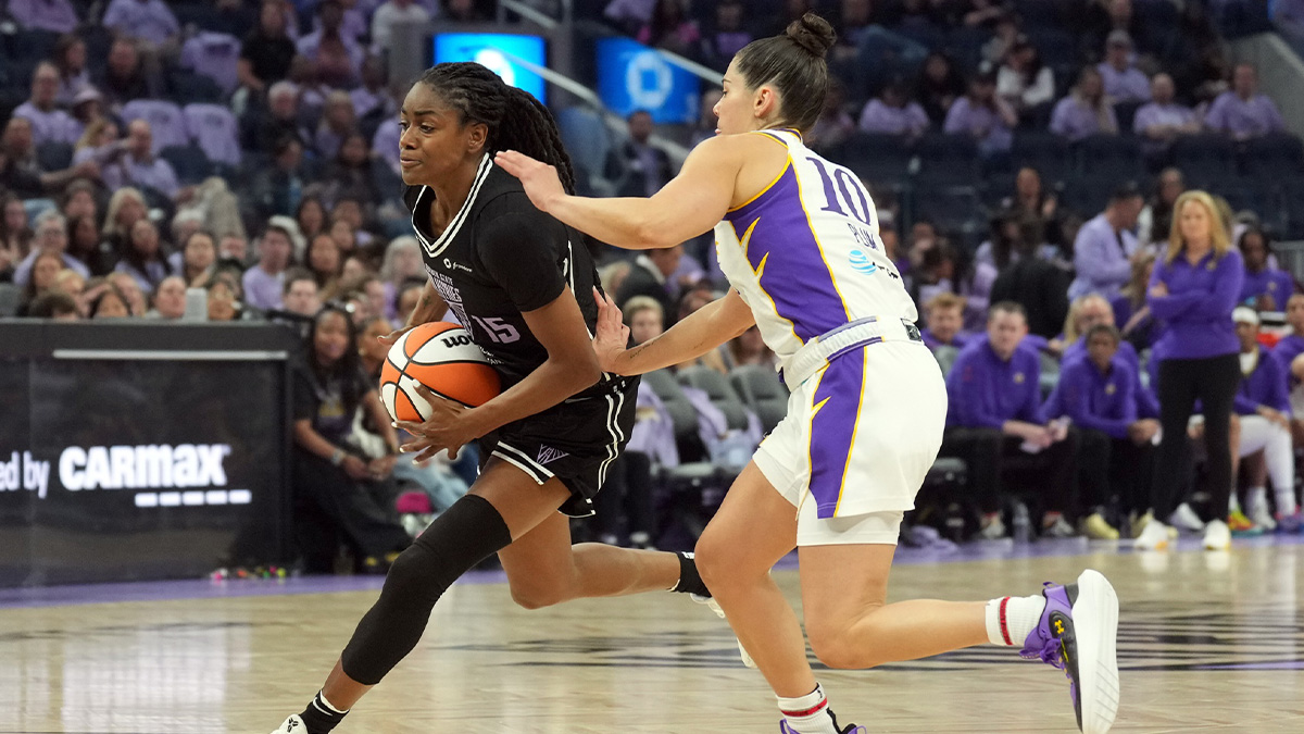 Golden State Valkyries guard Tiffany Hayes (15) drives against Los Angeles Sparks guard Kelsey Plum (10) during the third quarter at Chase Center.