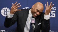 Former NBA star Vince Carter speaks at a jersey retirement press conference before a game between the Brooklyn Nets and the Miami Heat at Barclays Center.