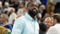 Dwyane Wade looks on at halftime between France and Canada in a men’s basketball quarterfinal game during the Paris 2024 Olympic Summer Games at Accor Arena.