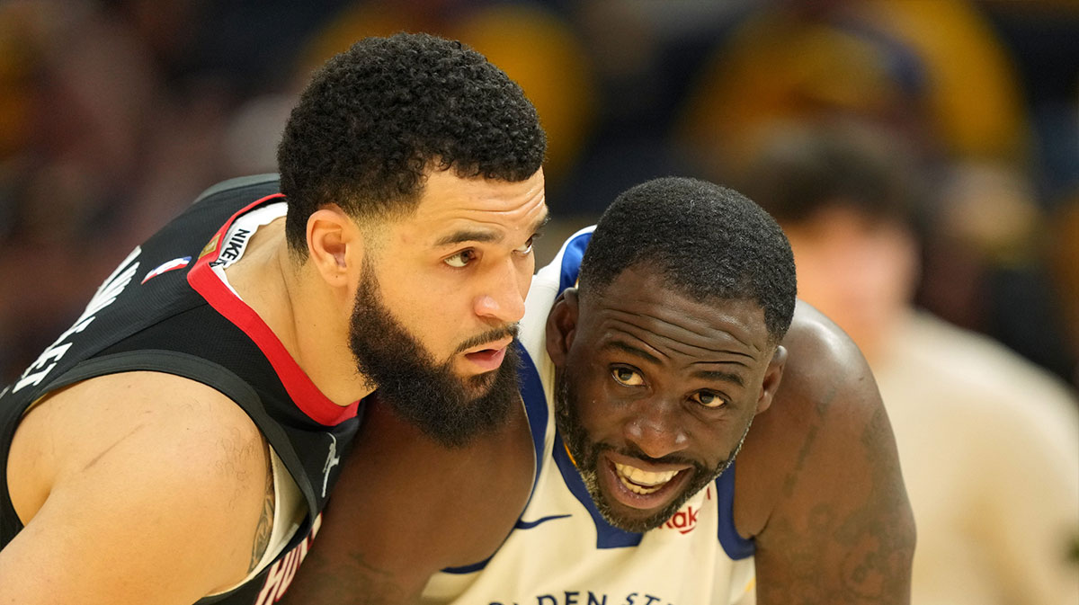 Houston Rockets guard Fred VanVleet (left) defends against Golden State Warriors forward Draymond Green (23) during the fourth quarter of game three of first round for the 2024 NBA Playoffs at Chase Center.