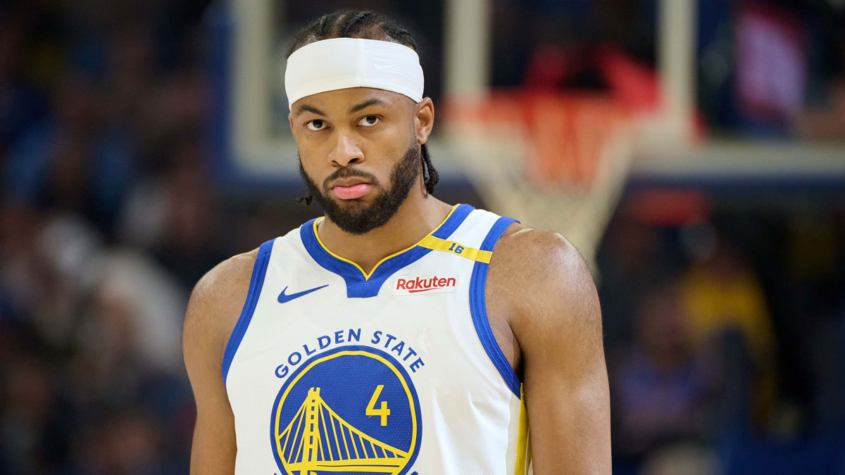 Golden State Warriors guard Moses Moody (4) walks on the court before the start of the first quarter against the LA Clippers at Chase Center.