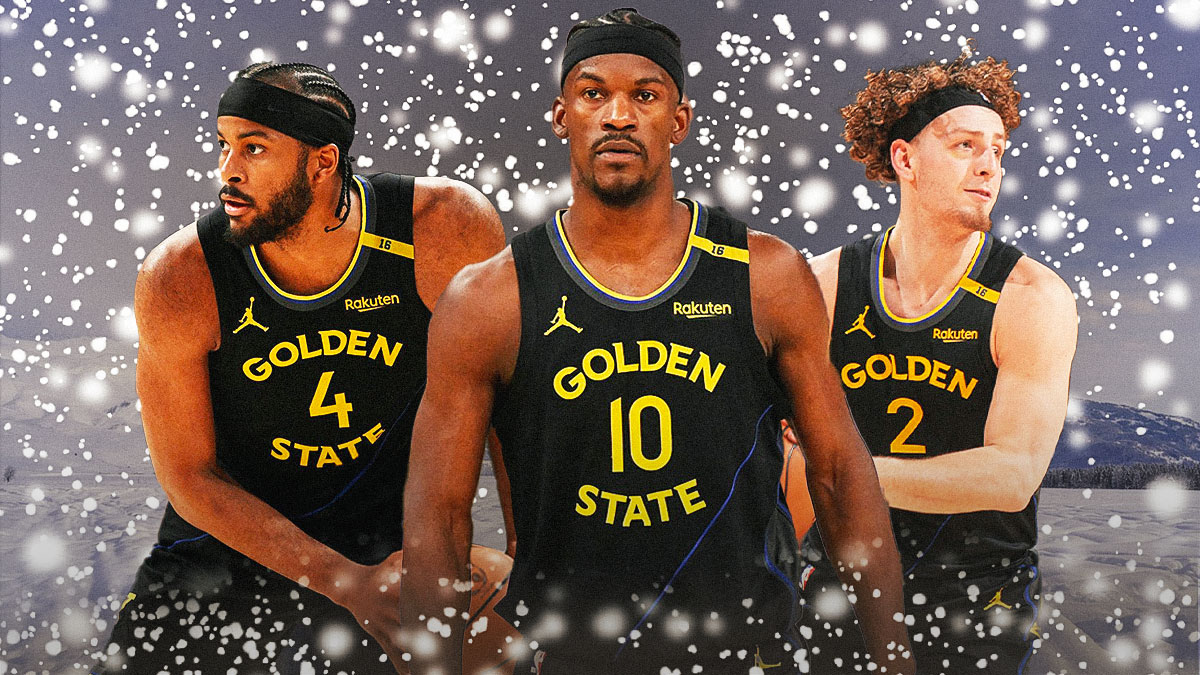 Jimmy Butler (in the middle), Moses Moody, and Brandin Podziemski in the cold with snowflakes falling around them with a wintery background. Butler's the only player of the three who isn't cold.