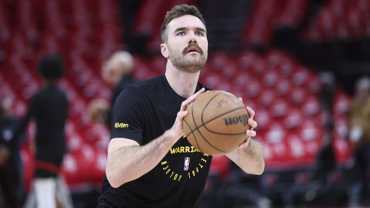 Golden State Warriors guard Pat Spencer (61) warms up before game seven of first round for the 2025 NBA Playoffs against the Houston Rockets at Toyota Center