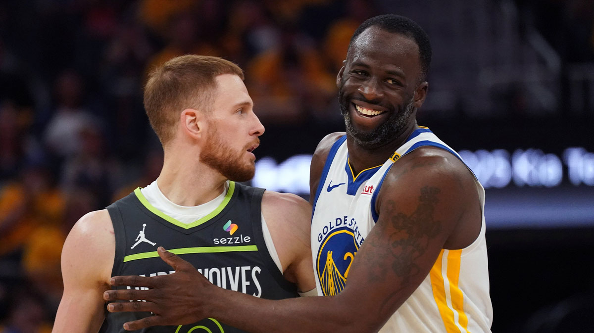 Warriors forward Draymond Green (23) come together in the second quarter during game three in the second round of the 2025 NBA Playoffs at Chase Center