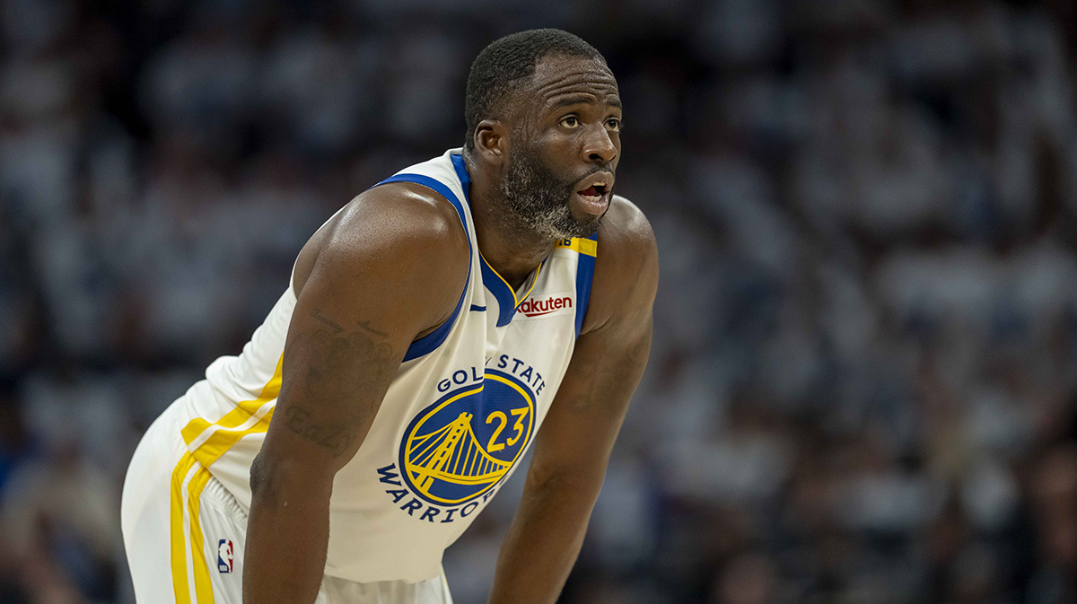 Warriors forward Draymond Green (23) looks on against the Minnesota Timberwolves in the second half during game two of the second round for the 2025 NBA Playoffs at Target Center with Dan Patrick in the background