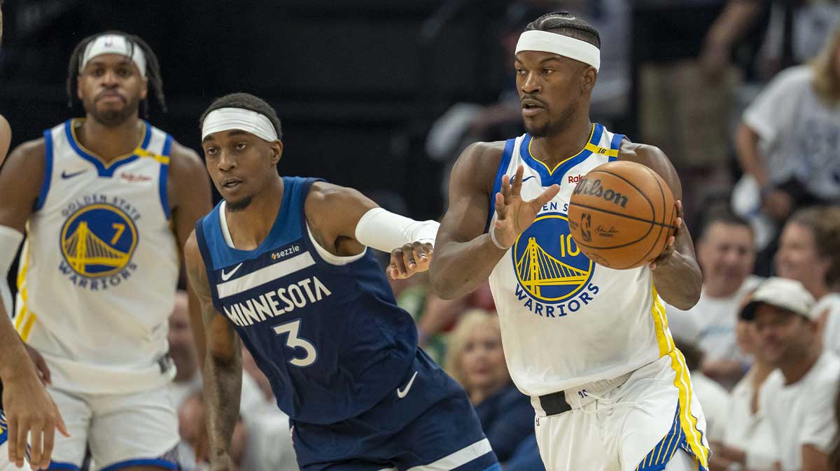 Warriors forward Jimmy Butler III (10) dribbles the ball