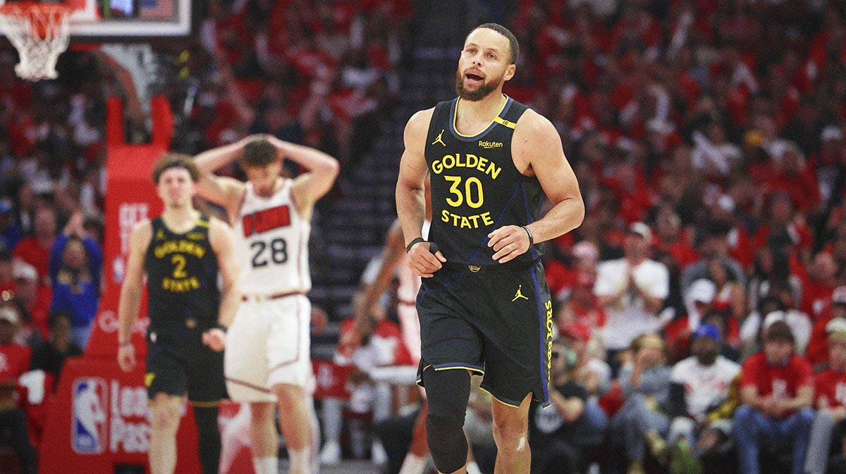 Golden State Warriors guard Stephen Curry (30) reacts after scoring a basket during the second half of game seven of the first round for the 2025 NBA Playoffs against the Houston Rockets at Toyota Center.