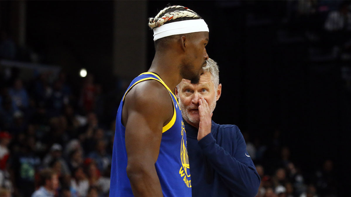 Warriors head coach Steve Kerr (right) talks with forward Jimmy Butler