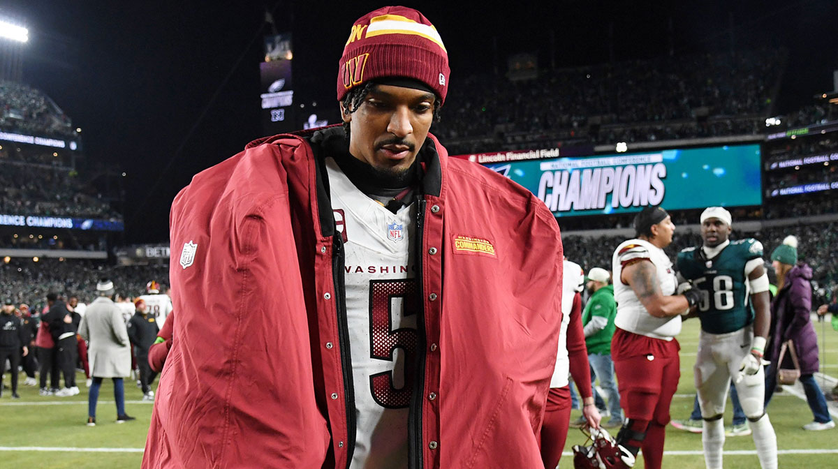 Washington Commanders quarterback Jayden Daniels (5) walks off the field after losing the NFC Championship game against the Philadelphia Eagles at Lincoln Financial Field.