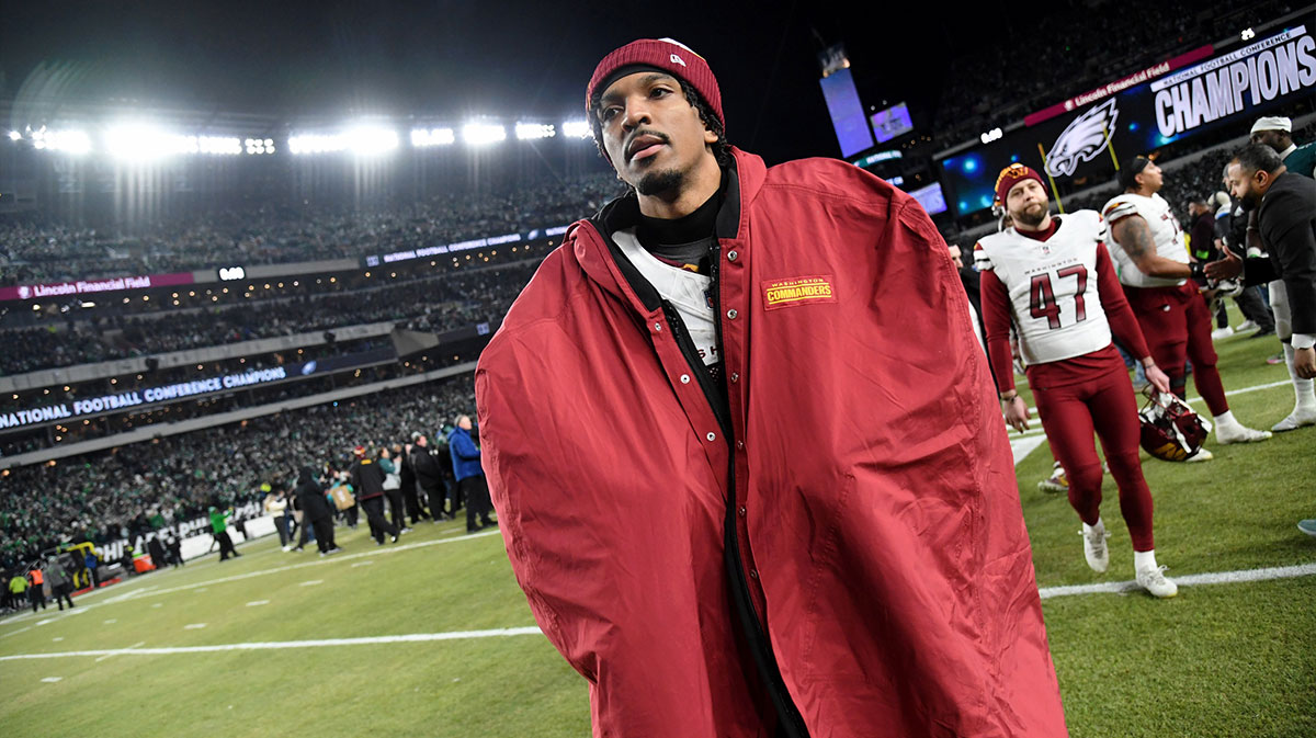 Washington Commanders quarterback Jayden Daniels (5) walks off the field after losing the NFC Championship game against the Philadelphia Eagles at Lincoln Financial Field.