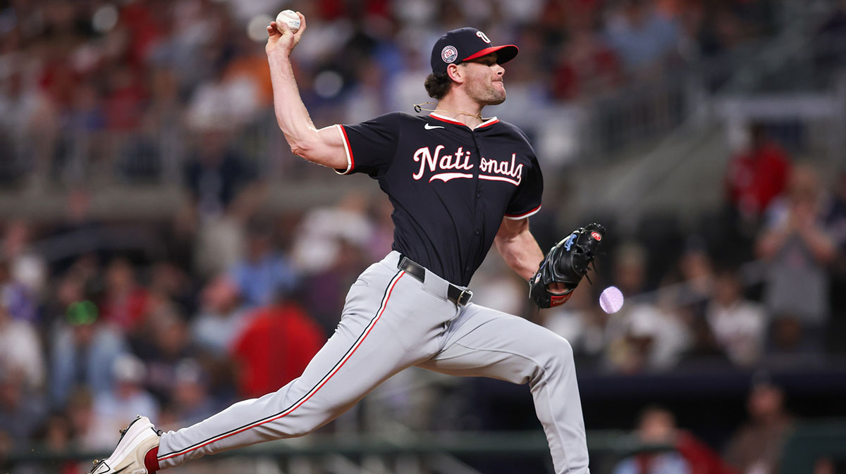Washington Nationals relief pitcher Kyle Finnegan (67) throws against the Atlanta Braves in the ninth inning at Truist Park.