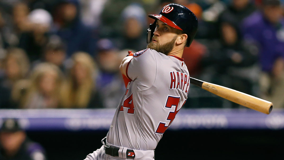 Washington Nationals outfielder Bryce Harper (34) bats in the fourth inning against the Colorado Rockies at Coors Field.