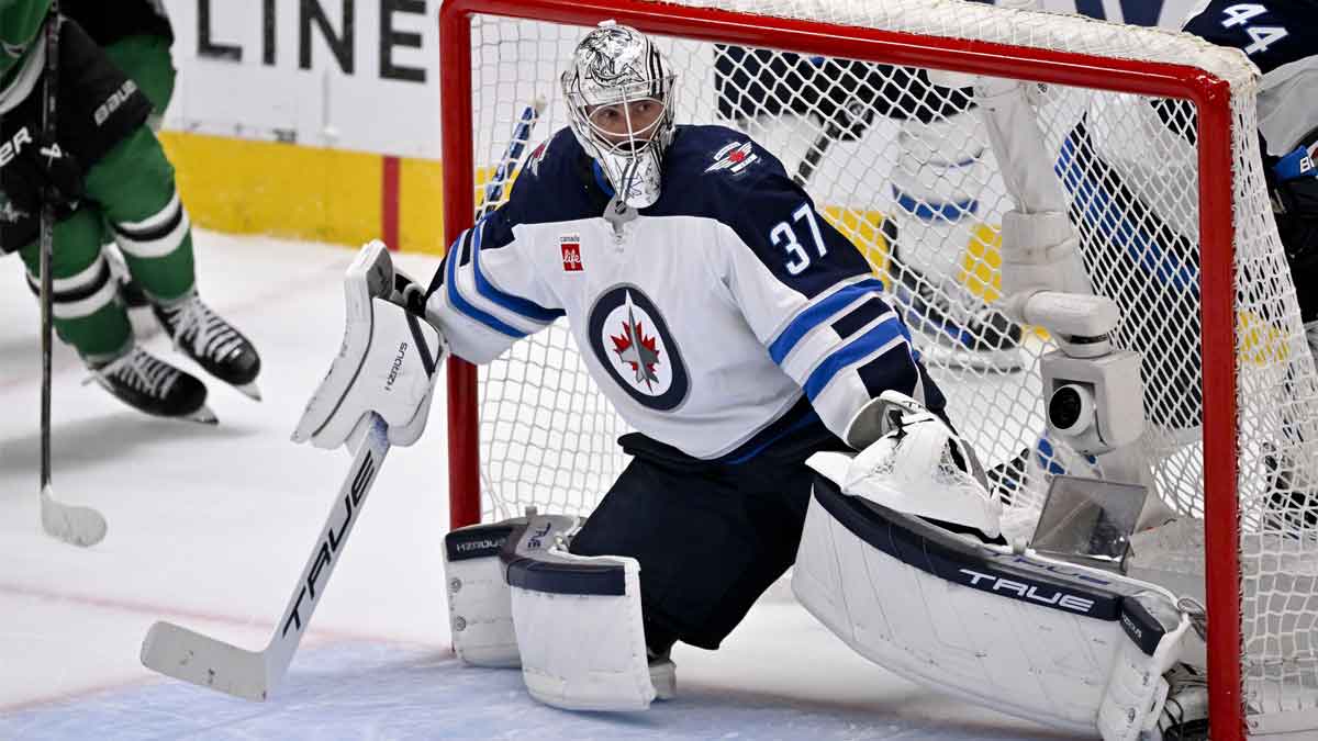 Winnipeg Jets goaltender Connor Hellebuyck (37) faces the Dallas Stars attack during the second period in game six of the second round of the 2025 Stanley Cup Playoffs at American Airlines Center.