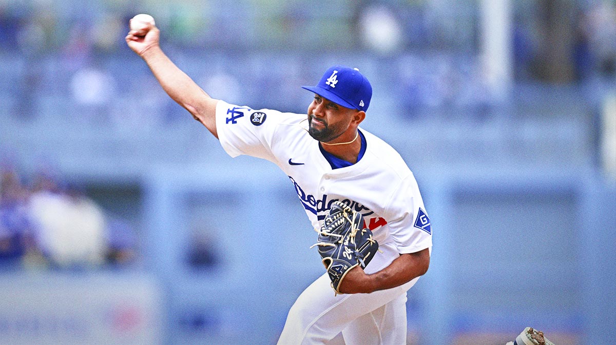 Los Angeles Dodgers pitcher Yoendrys Gomez (94) throws a pitch against the Pittsburgh Pirates during the ninth inning at Dodger Stadium.
