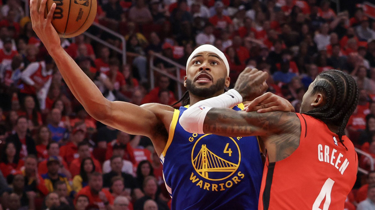 Golden State Warriors guard Moses Moody (4) drives to the net against Houston Rockets guard Jalen Green (4) in the second quarter during game five of first round for the 2025 NBA Playoffs at Toyota Center.