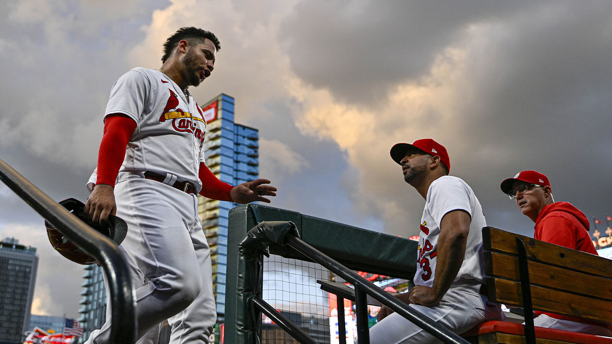 St. Louis Cardinals catcher Willson Contreras (40) talks with manager Oliver Marmol (37) after suffering an injury while running the bases during the third inning against the Oakland Athletics at Busch Stadium. Wilson was removed from the game before the fourth inning.