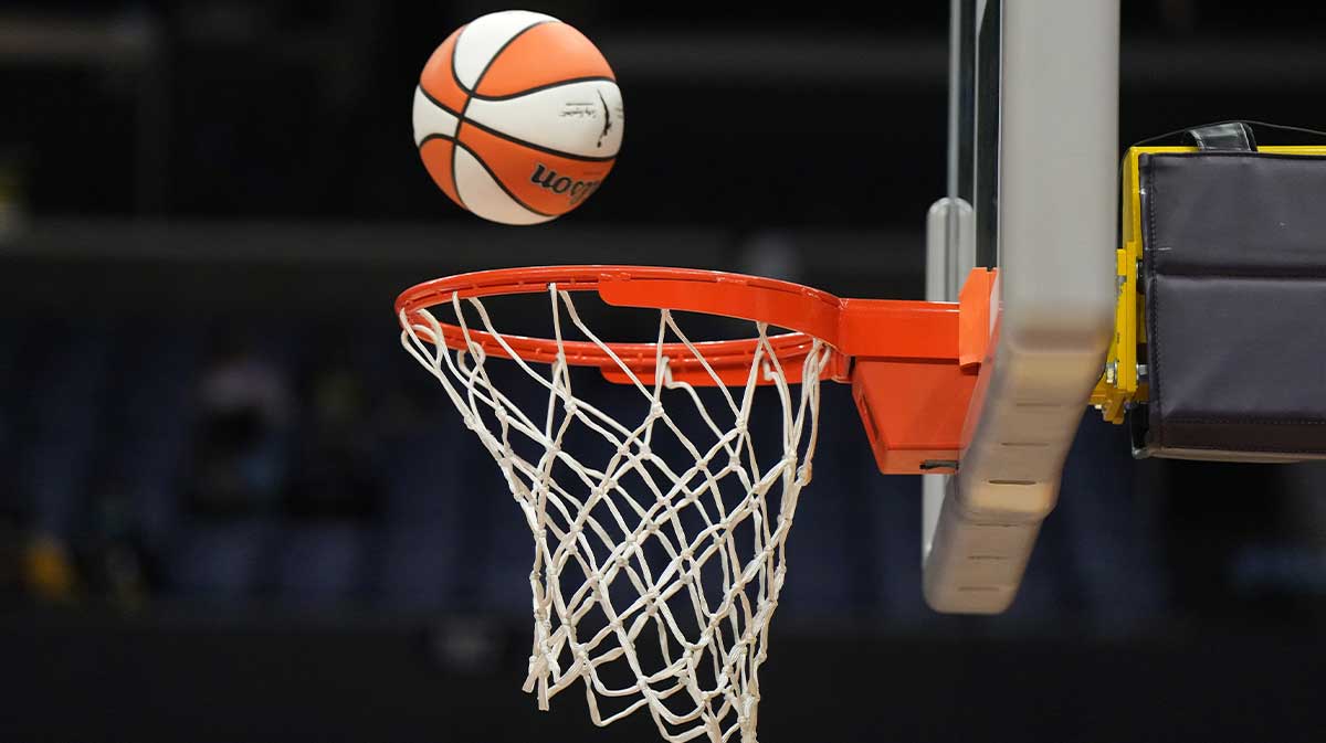 May 25, 2023; Los Angeles, California, USA; Wilson official basketball with WNBA logo goes through the net during the game between the LA Sparks and the Las Vegas Aces at Crypto.com Arena. Mandatory Credit: Kirby Lee-Imagn Images