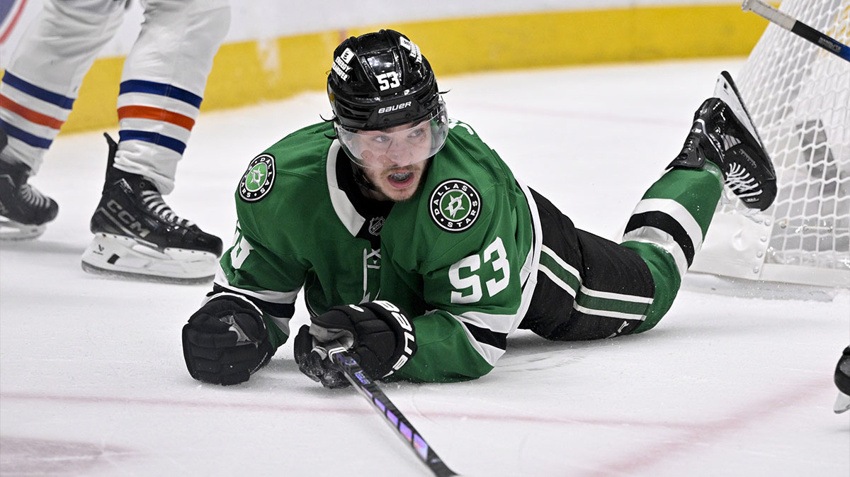 Dallas Stars center Wyatt Johnston (53) falls to the ice during the second period against the Edmonton Oilers in game two of the Western Conference Final of the 2025 Stanley Cup Playoffs at American Airlines Center.