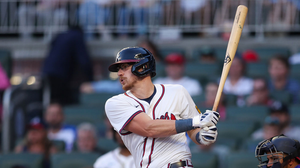 Atlanta Braves catcher Sean Murphy (12) hits a single against the Washington Nationals in the third inning at Truist Park.