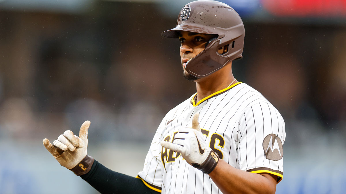 San Diego Padres shortstop Xander Bogaerts (2) celebrates with the dugout after hitting a broken bat single during the second inning against the Seattle Mariners at Petco Park.