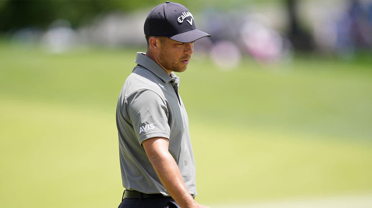 Xander Schauffele reacts after missing a putt 15th green during the final round of the PGA Championship golf tournament at Quail Hollow
