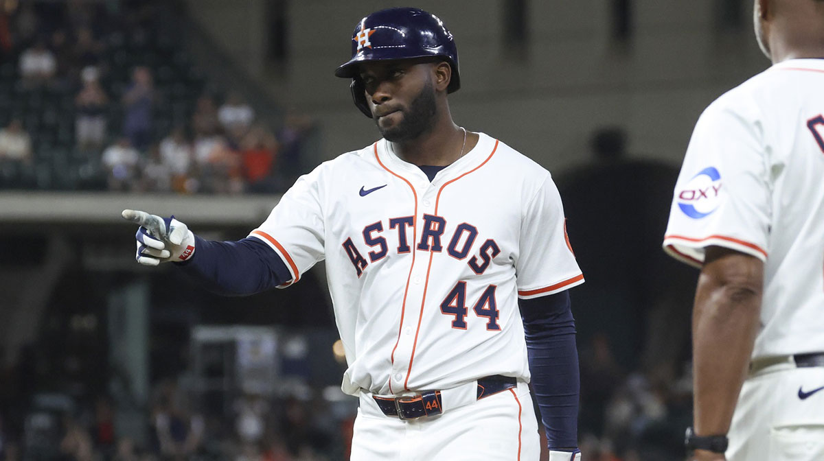 Houston Astros designated hitter Yordan Alvarez (44) points to the dugout after hitting an RBI single during the seventh inning against the Detroit Tigers at Daikin Park.