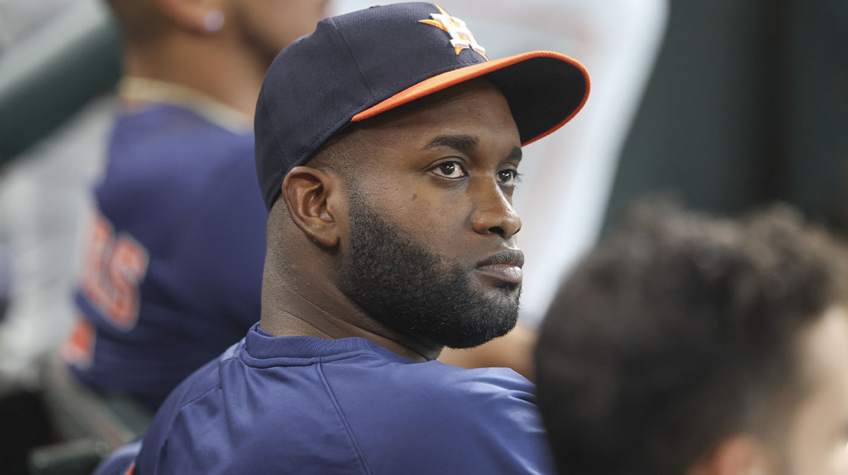 Houston Astros designated hitter Yordan Alvarez looks on from the dugout during the game against the Seattle Mariners at Daikin Park.