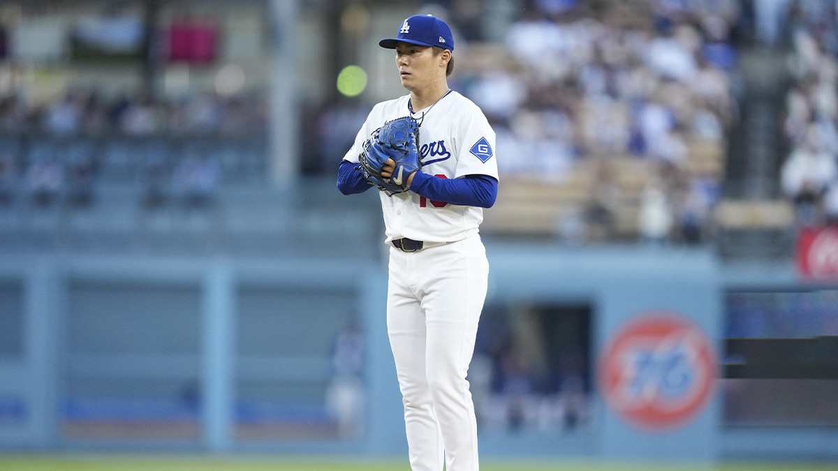May 20, 2025; Los Angeles, California, USA; Los Angeles Dodgers pitcher Yoshinobu Yamamoto (18) looks to throw a pitch in the first inning against the Arizona Diamondbacks at Dodger Stadium. Mandatory Credit: Kirby Lee-Imagn Images
