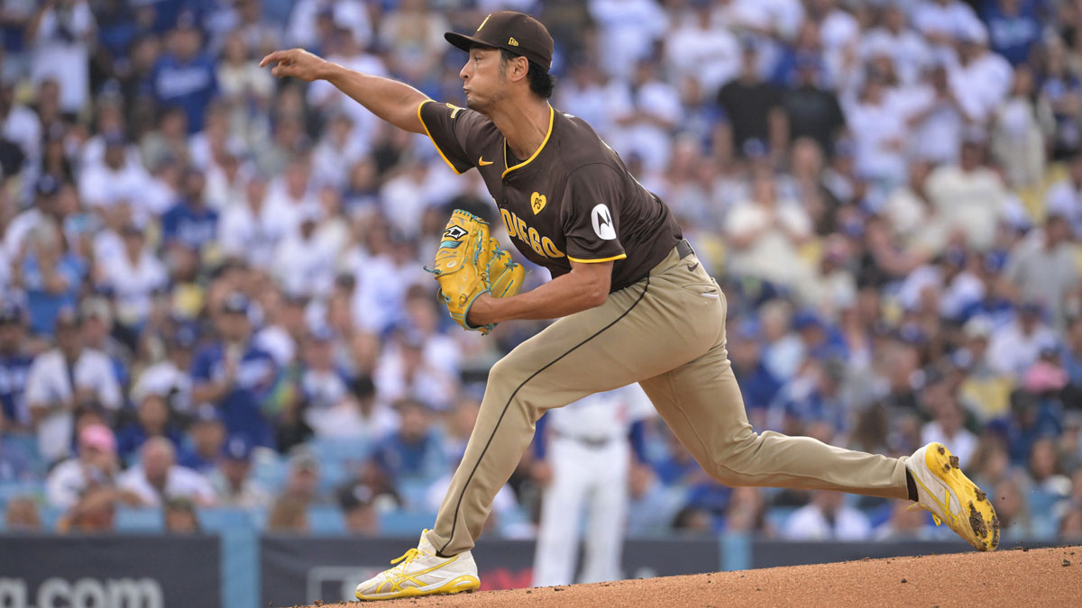 Oct 11, 2024; Los Angeles, California, USA; San Diego Padres pitcher Yu Darvish (11) pitches in the first inning against the Los Angeles Dodgers during game five of the NLDS for the 2024 MLB Playoffs at Dodger Stadium.