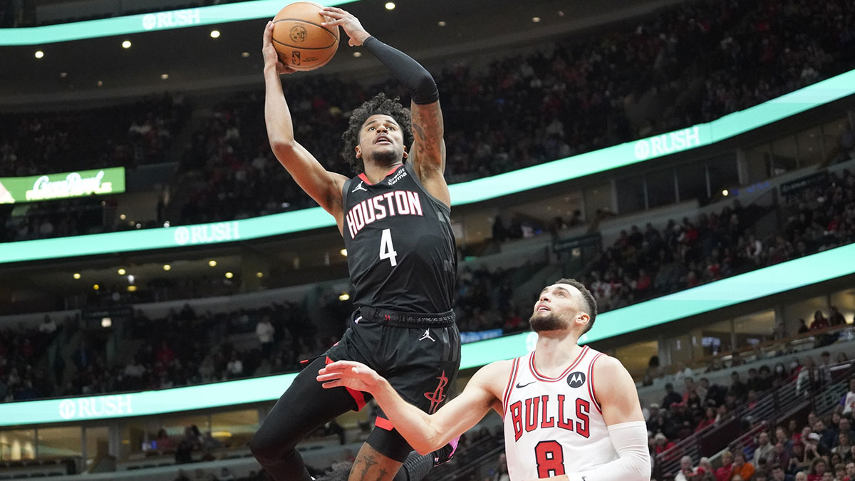 Jan 10, 2024; Chicago, Illinois, USA; Houston Rockets guard Jalen Green (4) shoots over Chicago Bulls guard Zach LaVine (8) during the first quarter at United Center. 
