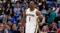 New Orleans Pelicans forward Zion Williamson (1) reacts after a dunk against the Los Angeles Clippers during the fourth quarter at Smoothie King Center.