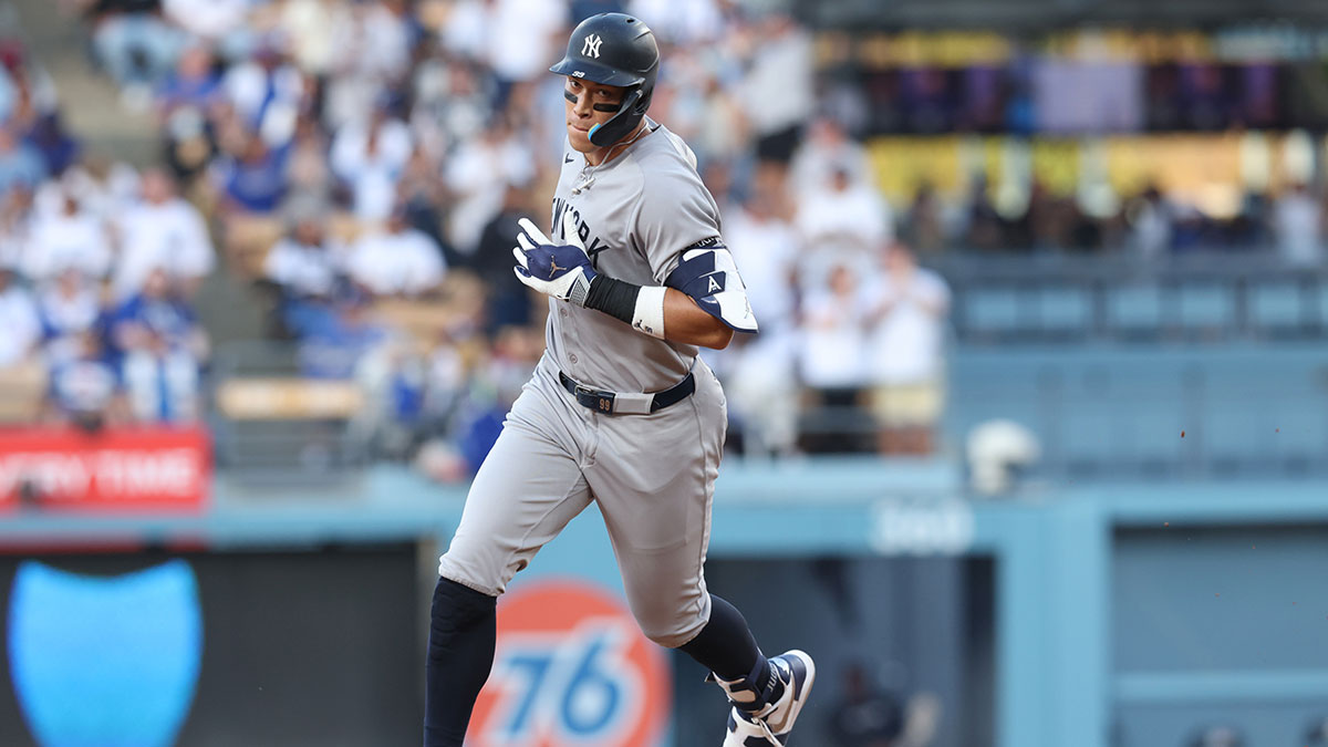 New York Yankees rightfielder Aaron Judge (99) rounds the bases after a home run during the first inning against the Los Angeles Dodgers at Dodger Stadium.