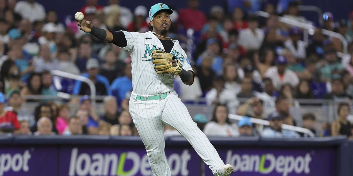 Miami Marlins third baseman Jean Segura (9) throws the baseball to first baseman Yuli Gurriel (not pictured) and retires Detroit Tigers right fielder Matt Vierling (not pictured) during the eighth inning at loanDepot Park